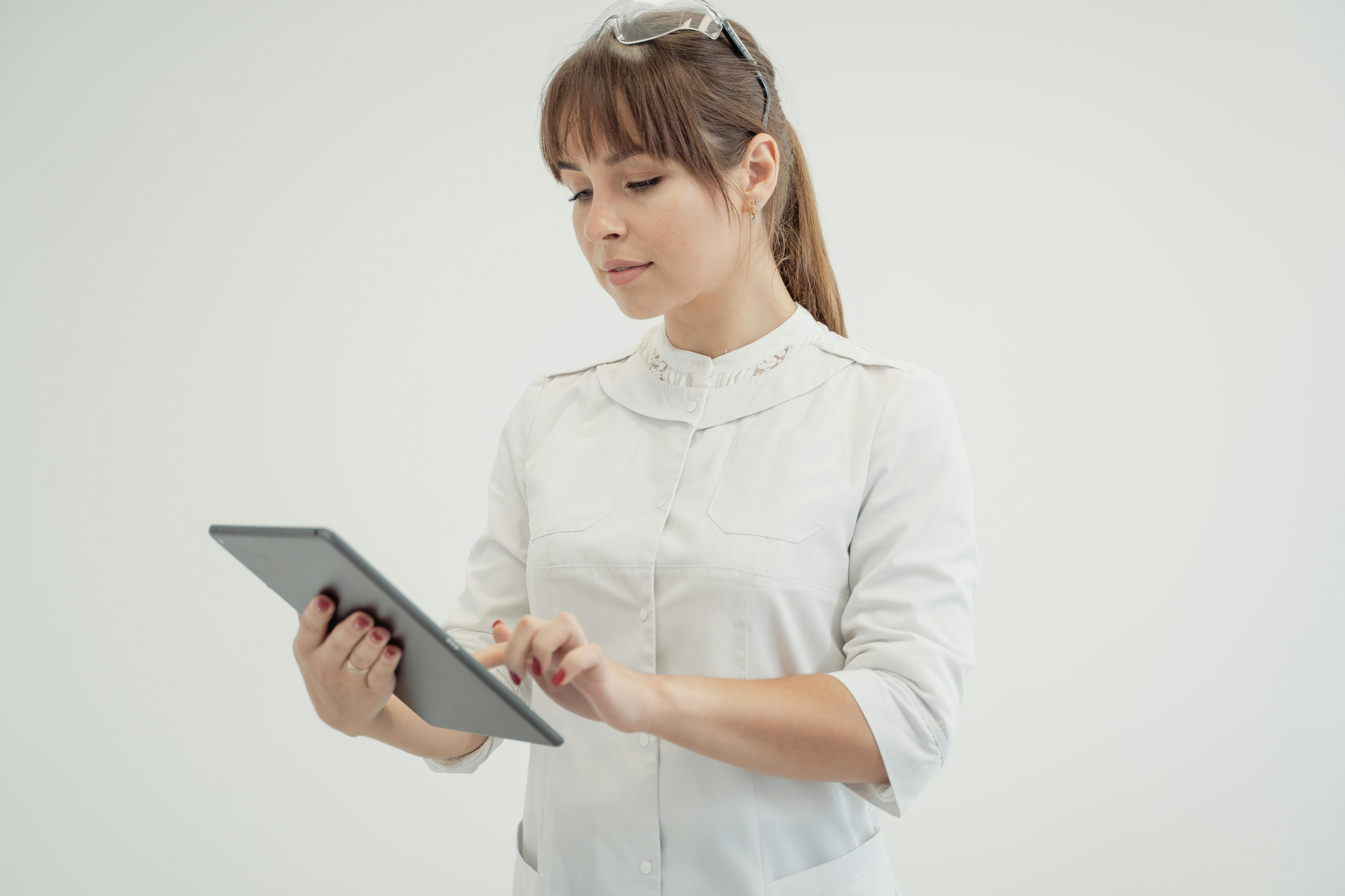 Doctor Using Tablet