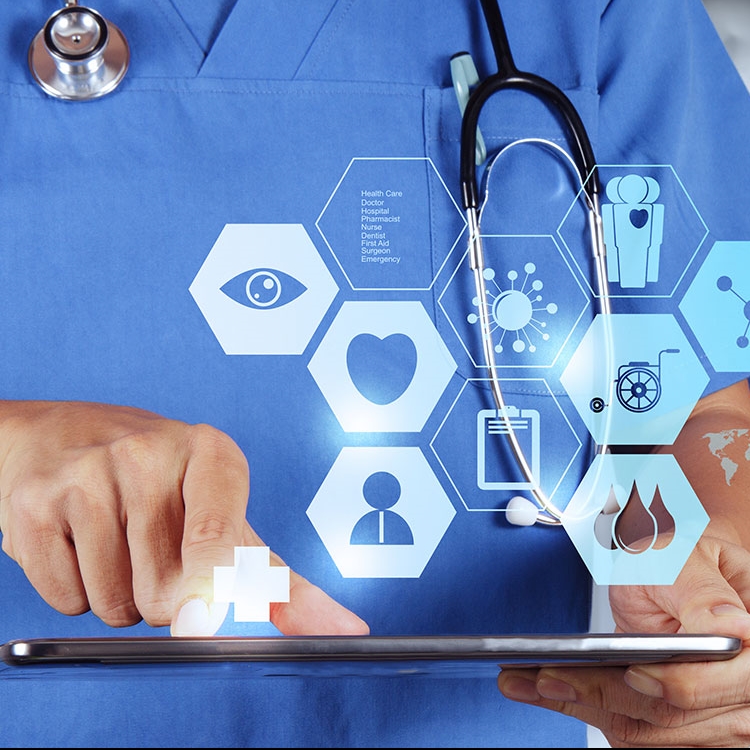 Doctor's hand on a tablet with icons showing
